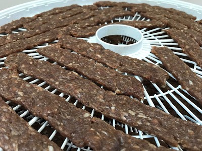 Jerky On NESCO Dehydrator Close Up